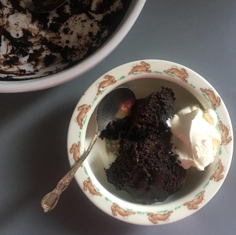Old-fashioned self-saucing chocolate and raspberry pudding fresh from the oven
