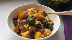 Rosemary roasted pumpkin and red onion with pearl couscous and green olives